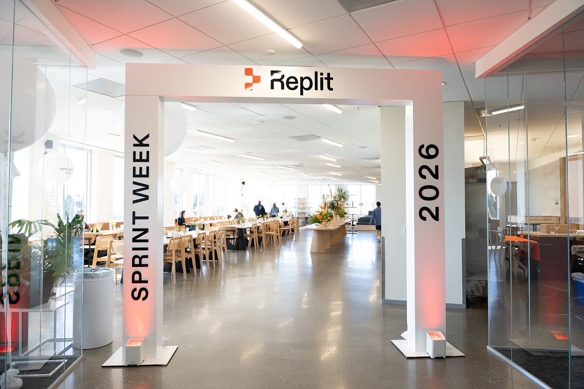 The Sprint Week 2026 entrance arch opening onto a bright, open dining hall